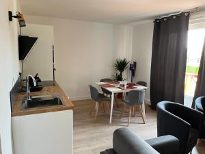 Appartements Appartement tout confort : photos des chambres