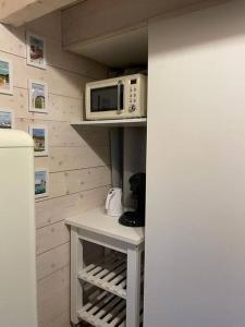 Appartements La petite maison d’Orphee : photos des chambres