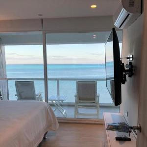 Apartamento en Sun Rise con Vista al Mar y Playa Privada