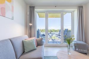 Ferienwohnung "Die Komfortzone" direkt am Nordseedeich mit Blick auf den See