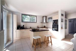 Maisons de vacances Guilhermy - Maison contemporaine avec jardin : photos des chambres