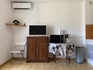 Appartements studio climatise avec parking : photos des chambres