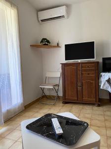 Appartements studio climatise avec parking : photos des chambres