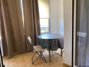 Appartements studio climatise avec parking : photos des chambres