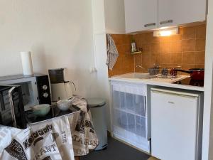 Appartements studio climatise avec parking : photos des chambres