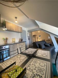 Appartements Le Grenier Saint-Pierre : photos des chambres