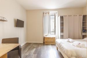 Appartements Le Garnier - Studio au coeur de la Doutre : photos des chambres