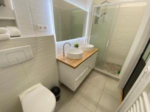 Appartements Le Sacre - CENTRE - Cour privative - WIFI : photos des chambres