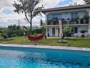 Appartements Appartement avec cuisine et grande piscine chauffee : photos des chambres