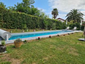 Appartements Appartement avec cuisine et grande piscine chauffee : photos des chambres