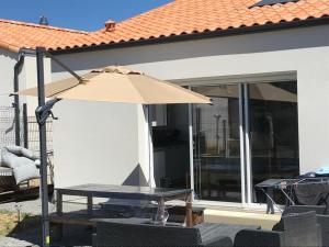 Maisons de vacances Maison cosy a 400 m de la mer! : photos des chambres