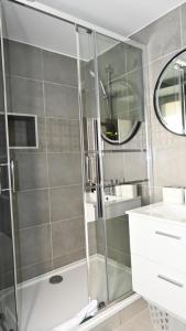 Appartements ZEN Appartement 10mn CDG Airport : photos des chambres