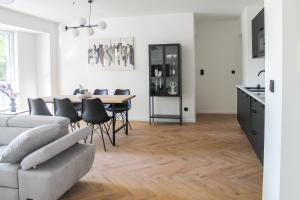 Modern Apartment - für Freunde & Familien, stadtnah, Parkplatz, E-Ladestation, Gitterbox für Fahrräder, Fitnessstudio, digitale Gästemappe mit Restaurant- und Unternehmenstipps