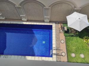 Villa Syariah Muvida dengan Kolam Renang di Tengah Kota