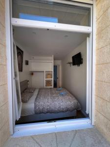 Appartements La petite place de la Porte d'Arras : photos des chambres