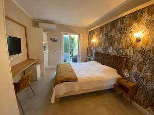 Hotels Hotel du Pont de l'Oso : photos des chambres