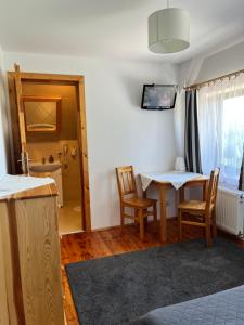 Zowiyrucha -100 m do wyciągów narciarskich i 900 m do term