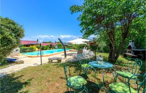 Awesome apartment in Rovinjsko Selo with Outdoor swimming pool WiFi and 2 Bedrooms
