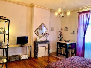 Appartements Le Regisseur : photos des chambres