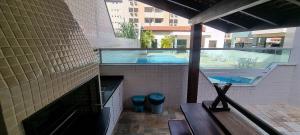 Apto com piscina e vista para o mar na Praia Grande em Ubatuba