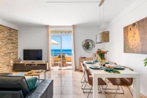 Beachfront triplex with swimming pool & parking