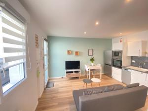 Appartements Le Remois - CENTRE - Cour privative - WIFI : photos des chambres