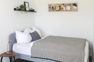 Tropical Apartment - für Freunde & Familien, stadtnah, Parkplatz, E-Ladestation, Gitterbox für Fahrräder, Fitnessstudio, digitale Gästemappe mit Restaurant- und Unternehmenstipps