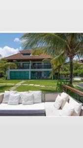 Flat beira mar no Manihi - Muro Alto