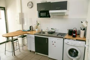 Appartements Relais du 21 : photos des chambres