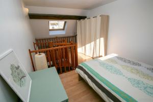 Appartements Relais du 21 : photos des chambres
