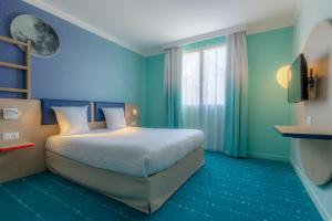 Hotels Grand Magic Hotel Marne La Vallee : photos des chambres