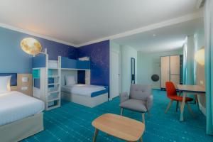 Hotels Grand Magic Hotel Marne La Vallee : photos des chambres