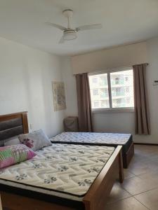 Pitangueiras 1 quarto cgaragem