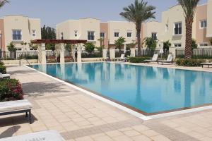 Elite Inn: Amaranta75 (Townhouse Direct pool view)