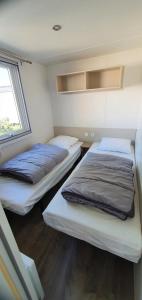Campings MH 6 personnes au calme Bois Dormant 4* : photos des chambres