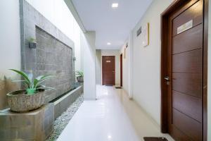 Urbanview Hotel Syariah Ratu Kuring Gisting by RedDoorz