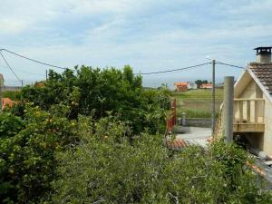 Antia Casita de piedra en Lariño