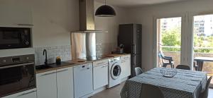 Appartements Anthony et Laetitia T2 vue sur jardin arbore : photos des chambres