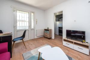 Appartements Le Saint Just avec salle de sport : photos des chambres