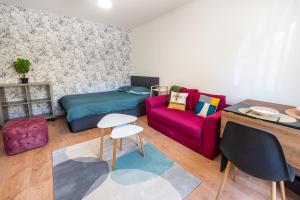 Appartements Le Saint Just avec salle de sport : photos des chambres