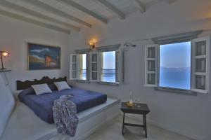Petite Suite with Private Caldera View Balcony room in Cori Rigas Suites