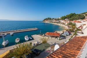 Apartments by the sea Podgora, Makarska - 11469