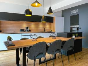 "Limprévue", standing et jardin au pied de Notre-Dame