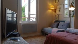 Appartements PARIS AUTHENTIC HOUSE Small, bright and calm studio : photos des chambres