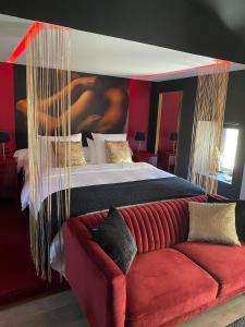 Appartements Suite Gatsby - balancoire et baignoire duo - Luxe et charme - climatisation : photos des chambres