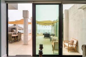 Tritons Playhouse Beachfront