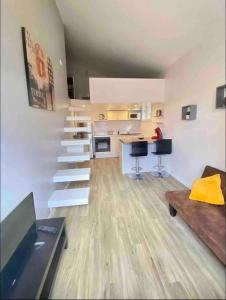 Appartements T1 bis Duplex recent + parking+jardin bien place : photos des chambres