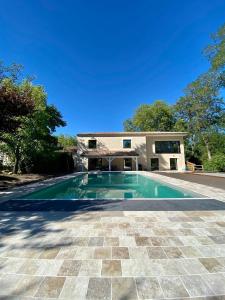 Maisons de vacances La Maison L'Eperon, stylish 5 star villa surrounded by vineyard near Saint Emilion : photos des chambres
