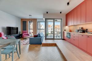 Granaria Premium Riverside & Parking by Downtown Apartments