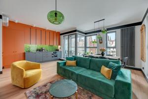 Granaria Premium Riverside & Parking by Downtown Apartments